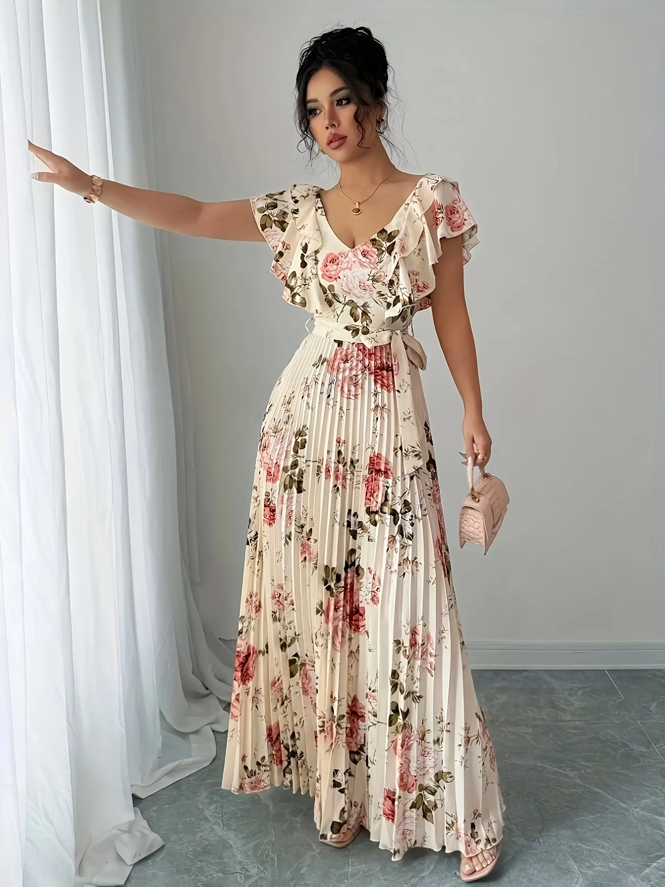 A women's apricot colored vneck fashionable Boho Floral rose print pleated maxi dress, with a gentle print and a flowing pleated skirt suitable for commuting to work, shopping and outdoor activities, indoor and outdoor dressing