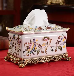 European-style Ceramic tissue holder with classic floral motifs and decorative bronze base