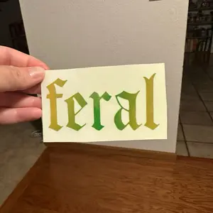 Feral vinyl decal for car, truck, window, and planner