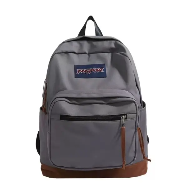 JanSport Grey Suede-Panel Backpack—a high-capacity back-to-school backpack that doubles as a laptop bag and travel pack.
