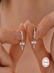 S925 Sterling Silver Bowknot CZ Huggie Hoop Earrings, Hypoallergenic Earrings for Sensitive Ears Dainty Bow Drop Dangle Earrings in Silver/Gold Plated, Minimalist Cubic Zirconia Earrings for Women Girls, Ideal Gift for Daily & Special Occasions