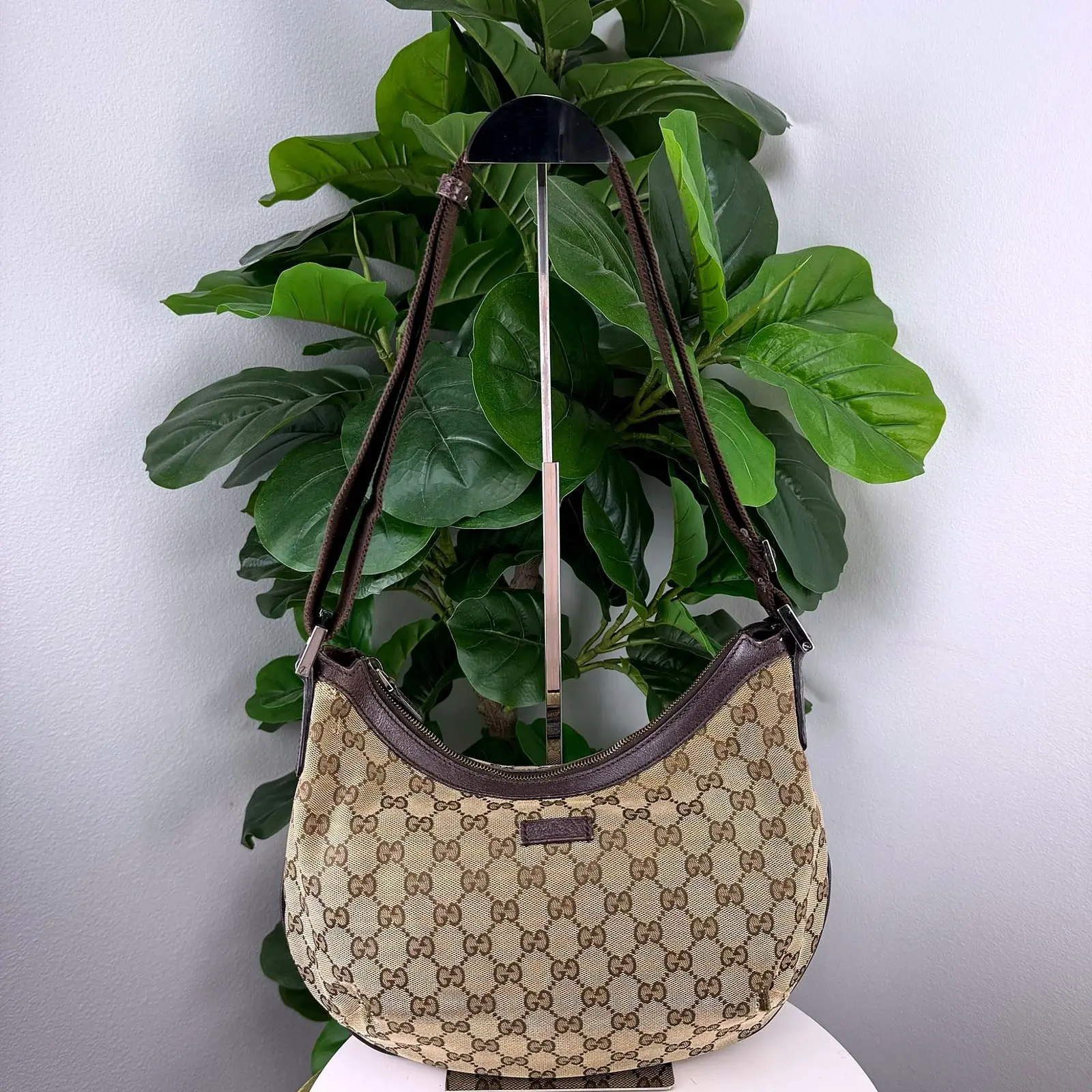 Pre-owned GG monogram canvas with brown leather trim and gold-tone hardware Shoulder Bags Authentic Vintage Gucci GG Monogram Canvas Shoulder Hobo Bag