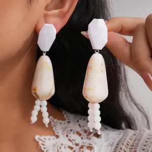 A pair of acrylic water drop fringed earrings, personalized ethnic style fashion women's stud earrings