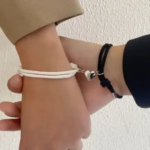2-piece set of black and white bracelets, heart-shaped magnetic couple bracelets, suitable for good friends, brothers, parties, students, and travel.Fashionable and elegant, silver version