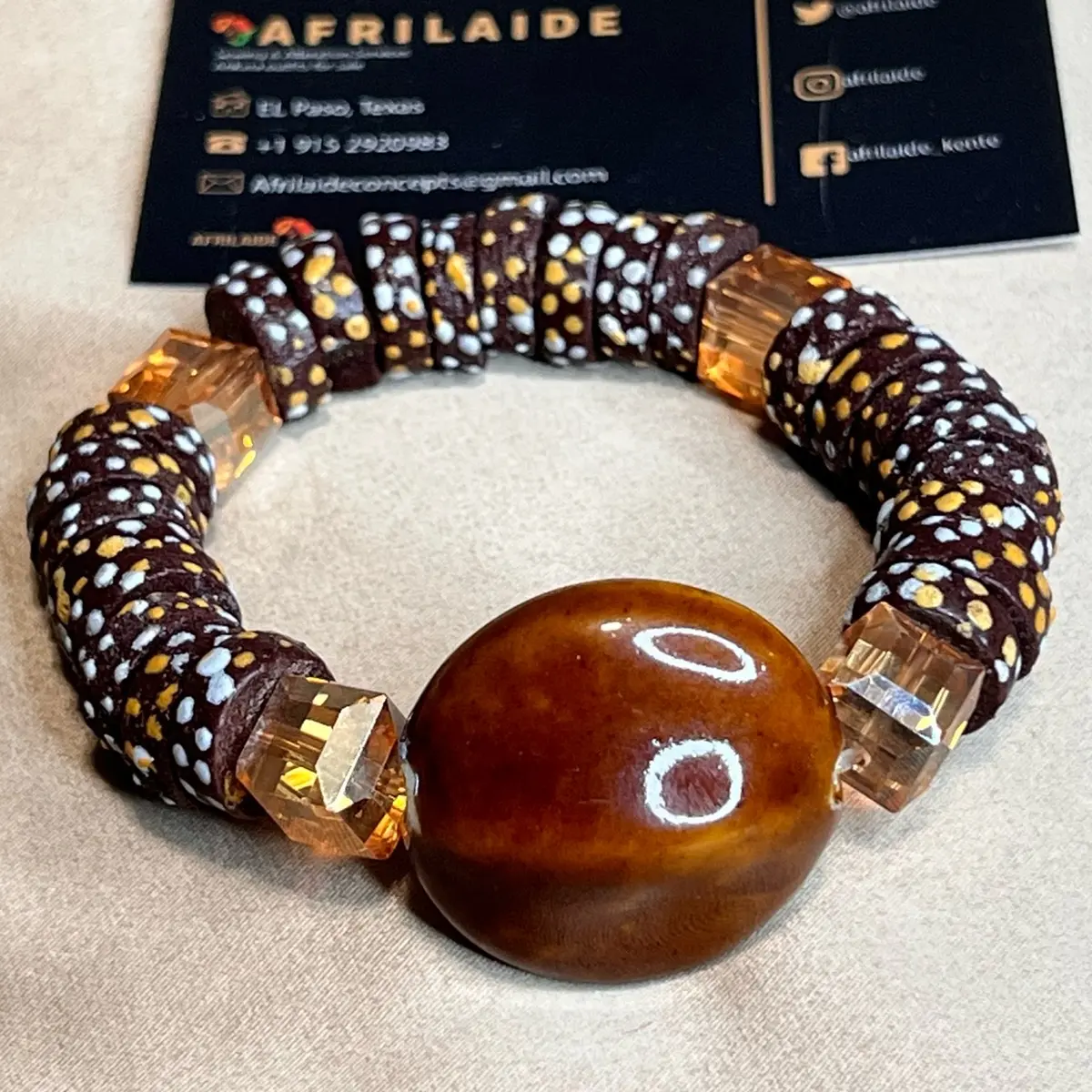 AfriLAIde Sefakor Brown African Bead Bracelet with Polka Dot Design and Transparent Accents