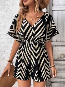 A women's black and off-white zigzag striped V-neck romper, Beach jumpsuit with puff sleeves and a cinched waist, Fitted, suitable for casual occasions like weekend outings or gatherings with friends, Striped print romper