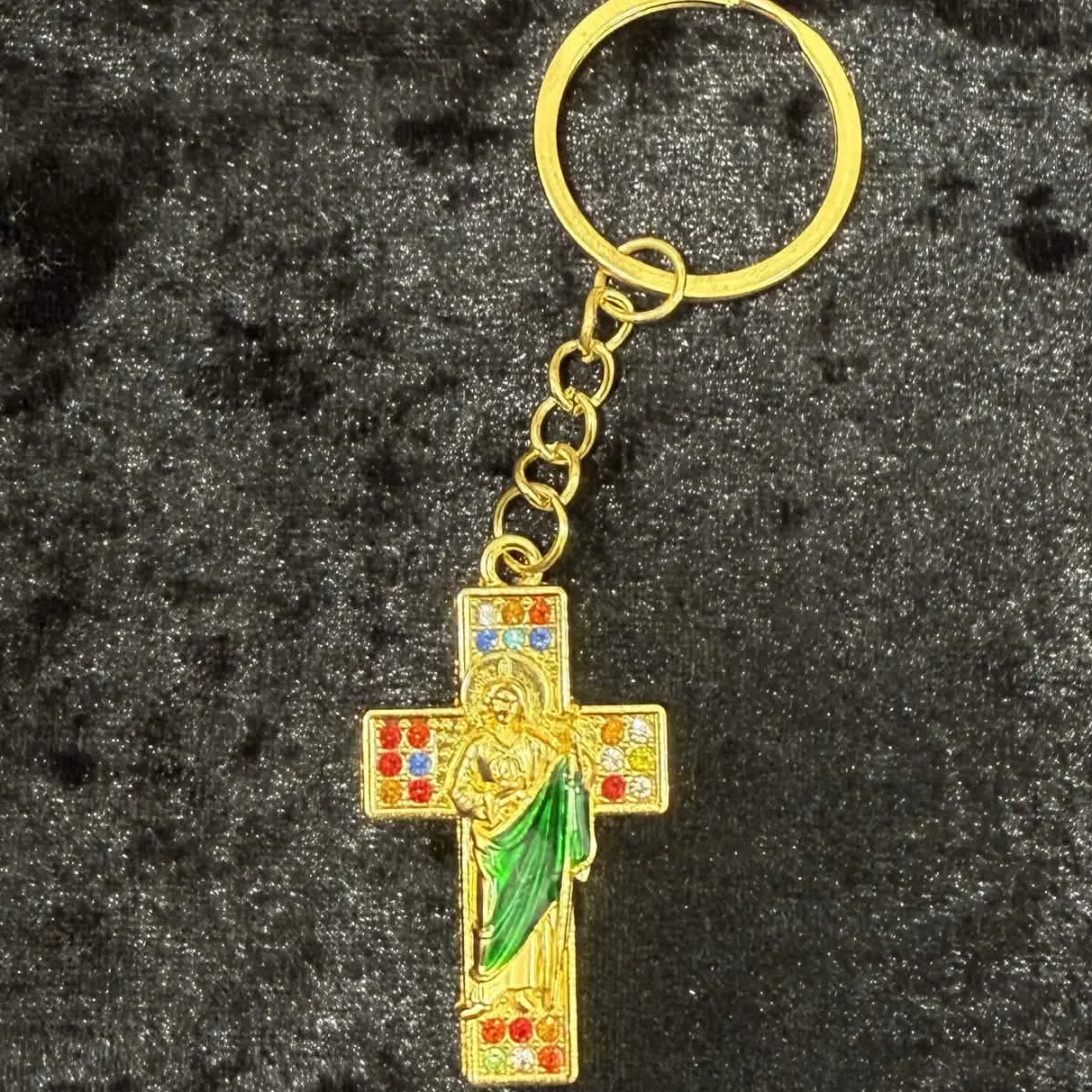 saint gold keychain