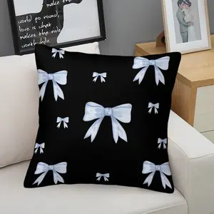 Soft short plush throw pillow with black background and blue bowknot print pattern, featuring a variety of patterns, soft and skin-friendly, a comfortable good for home or travel, embodying a lazy home style