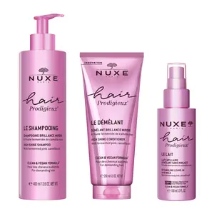 NUXE Prodigieux Hair Glow-Up Trio. Includes Hair Prodigieux High Shine Shampoo 13.6 Fl Oz, Conditioner 6.8 Fl Oz, Detangling Leave-In Hair Milk 3.3 Fl Oz. For Soft, Shiny Hair. Radiance Boost with Fermented Pink Camellia Oil