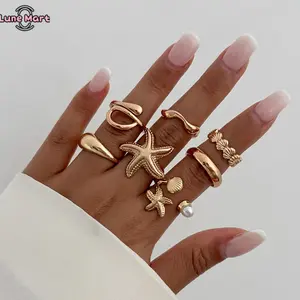 Women's 8-Piece Charm Stackable Ocean-Style Ring Set - Gold & Silver Tone, Adjustable, Starfish Shell Pearl Accents, Beach Summer Costume Jewelry Accessories, Charm Stacking Rings