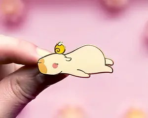 Curly the Capybara Lying Down Enamel Pin