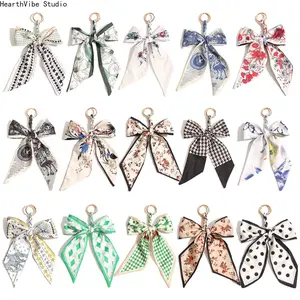 Women's New Creative Hand-Woven Silk Scarf Bowknot Keychain Charm, Trendy Cute Keychain, Bag Charms, Versatile Purse Chain Accessory for Sports Bags