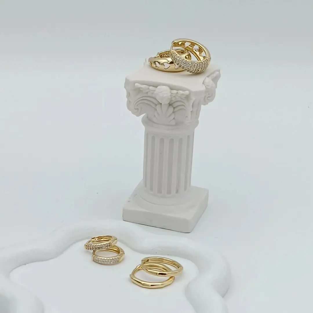 Small hoops in various styles. 14k gold plated, high quality Small hoops in various styles. 14k gold plated, high quality