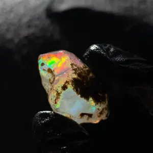 7.8 gram Ethiopian specimen water opal milky white contra luz crystal rainbow