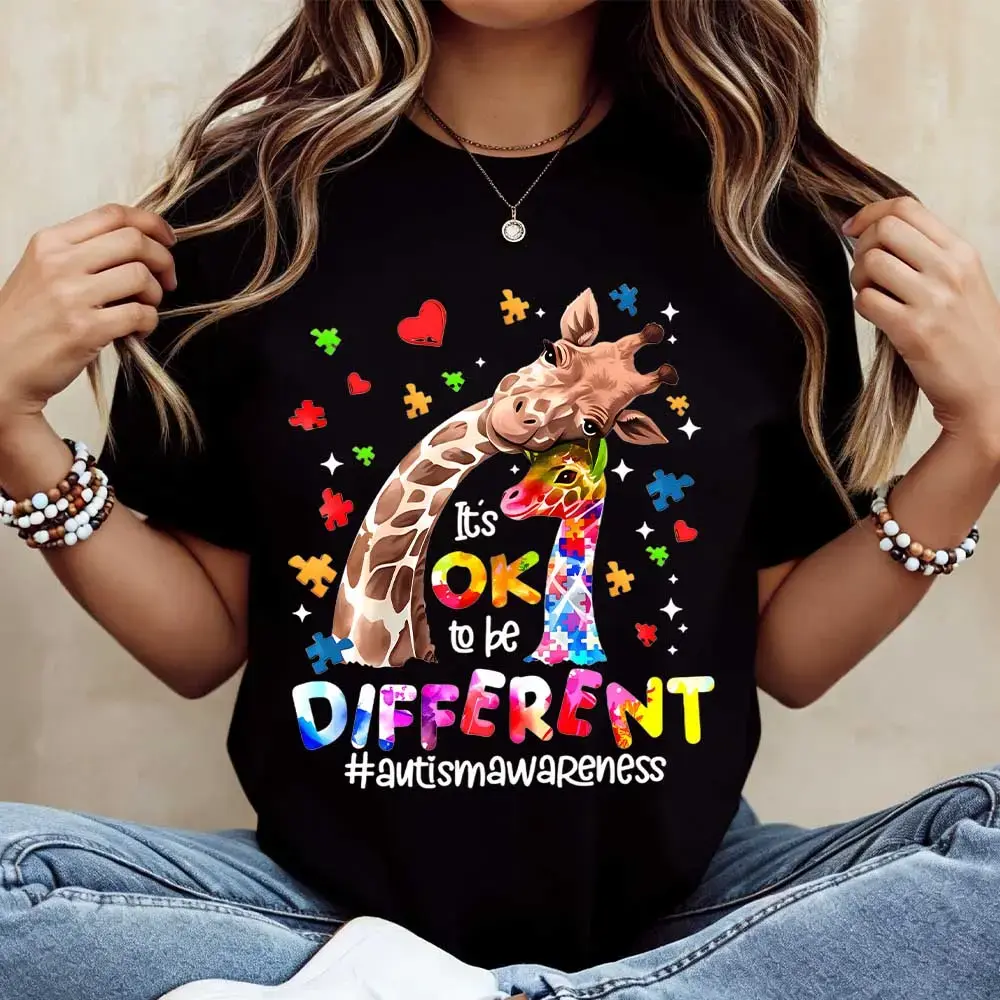 Giraffe With Puzzle Pieces And Hearts Print Ok To Be Different Autism Awareness T Shirt Casual Loose Fit Women's Top For Everyday Wear And Special Occasions