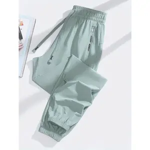 Women’s high-elasticity nylon joggers — casual sports pants with an elastic waistband, flared ankles, and side pockets; breathable knit fabric for spring and summer; summer joggers | flared-ankle pants | breathable fabric