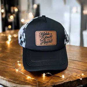 Bless Your Heart Trucker Hat - Black with Checkered Panel, Brown Patch, and "Bless Your Heart" Text