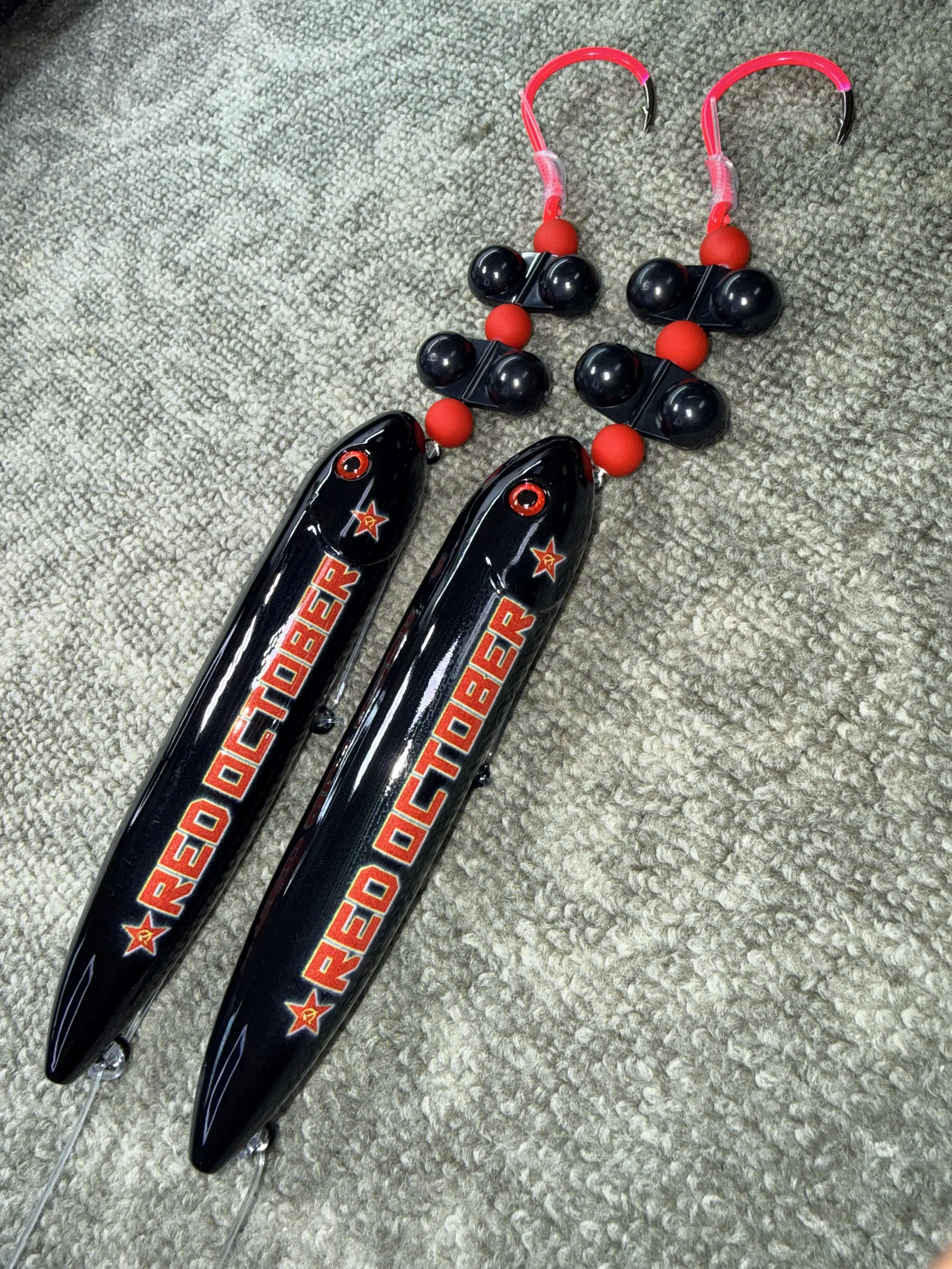 Red October Rig Large (13cm) 2 Pack: Pre-tied subs on 8/0 fluorescent pink hook and 100 pound smoke blue mono leader line