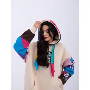 Colorful Patchwork Hoodie with Cartoon Graphics