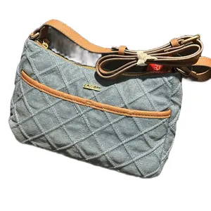 Rosetti Quilted Crossbody Bag with Adjustable Strap and Zipper Closure for Everyday Use