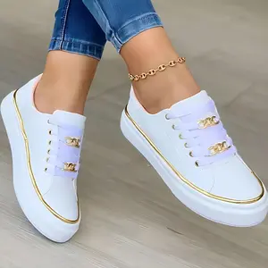 Ladies' fashionable low cut canvas sneakers  white with gold accents, comfortable walking shoes, casual flat bottom design, lightweight and breathable