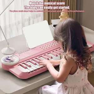 A music keyboard with clear sound, 37 keys, 5 instrument sounds, microphone, instrument toy, music learning keyboard toy, can be plugged in via USB, can be used with AA batteries (AA batteries need to be provided)