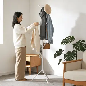 Freestanding Metal Coat Rack (3 Hooks) - Sturdy Single-Bar Storage Rack For Bedrooms, Entryways, And Closets - Space-Saving Clothing Hooks, Robust Wrought Iron Construction, Garment Hook Rack, Space-Efficient Storage Solution.