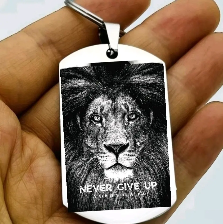never gove up lion hot keychain