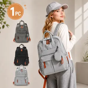 Unisex large-capacity backpack, waterproof and stain-resistant casual daypack with a detachable mini storage bag for holding earphones and coins. Lightweight and durable, suitable for teenagers and adults, it is an ideal choice for school, travel, outdoor