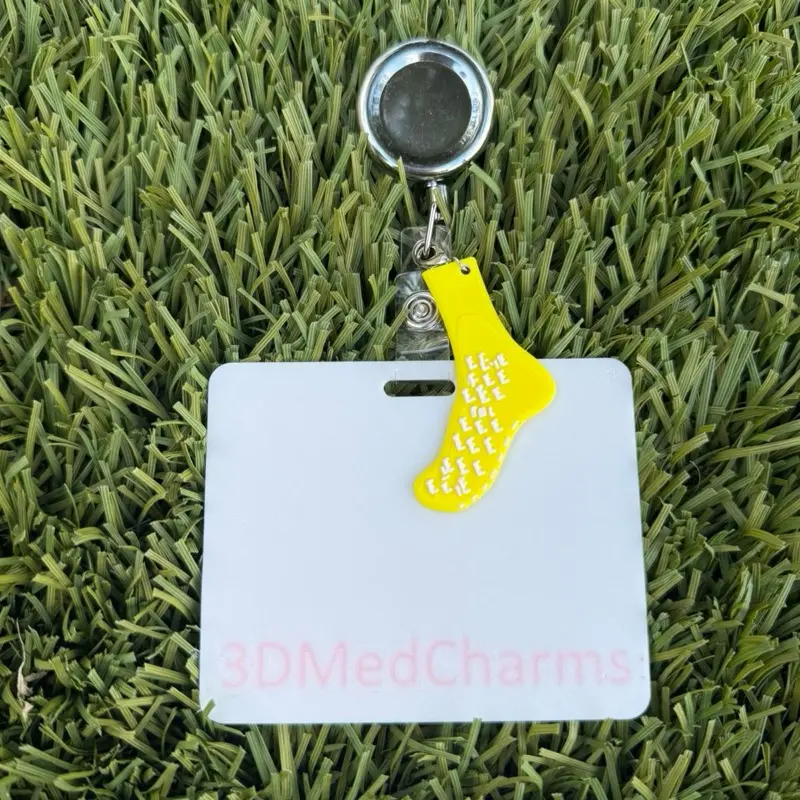 Yellow sock badge keychain
