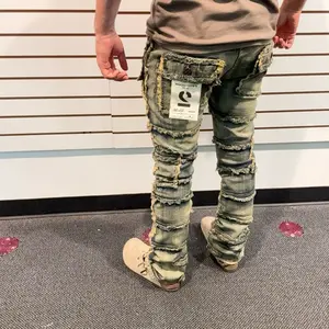 Men's Stacked Flare Jeans with Distressed Design and design all over around jeans.