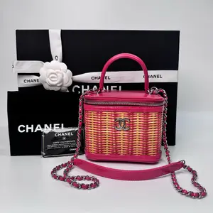 Pre-owned CHANEL Preowned Mini Wicker Vanity Case Magenta Leather Edging Top Handle Bag 13cm Base 2023 Serial N22821760