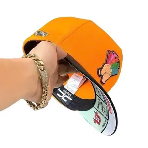 The Orange Money Hand Snapback Blends Edgy Street Fashion With Practical Comfort, Featuring Mesh Panels, Adjustable Sizing, And A Bold Black Magic Aesthetic.