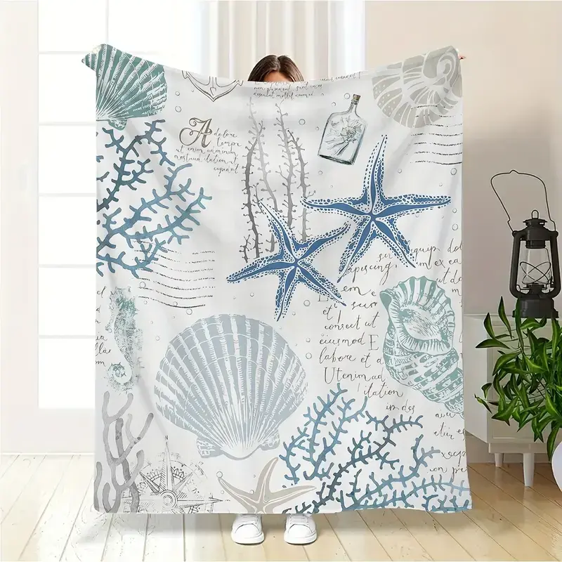 A modern ocean-themed blanket – machine-washable flannel with a coastal print featuring shells and corals – soft and comfortable multipurpose blanket suitable for travel, camping, and home décor – an ideal gift for all seasons80