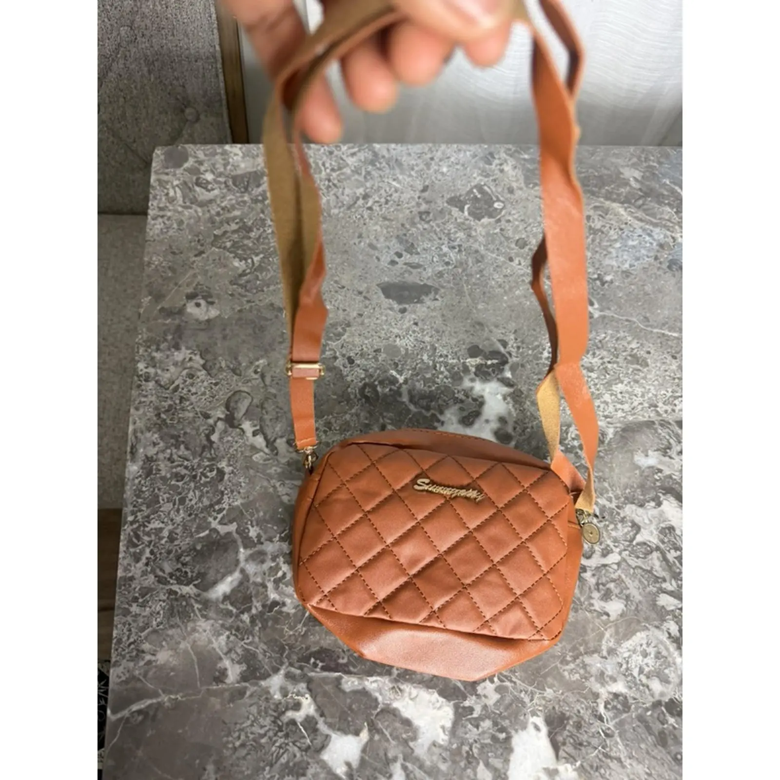 Quilted Brown Leather Crossbody Bag with Adjustable Strap and Gold Hardware