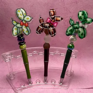 One of a kind, balloon dog beaded it Pens