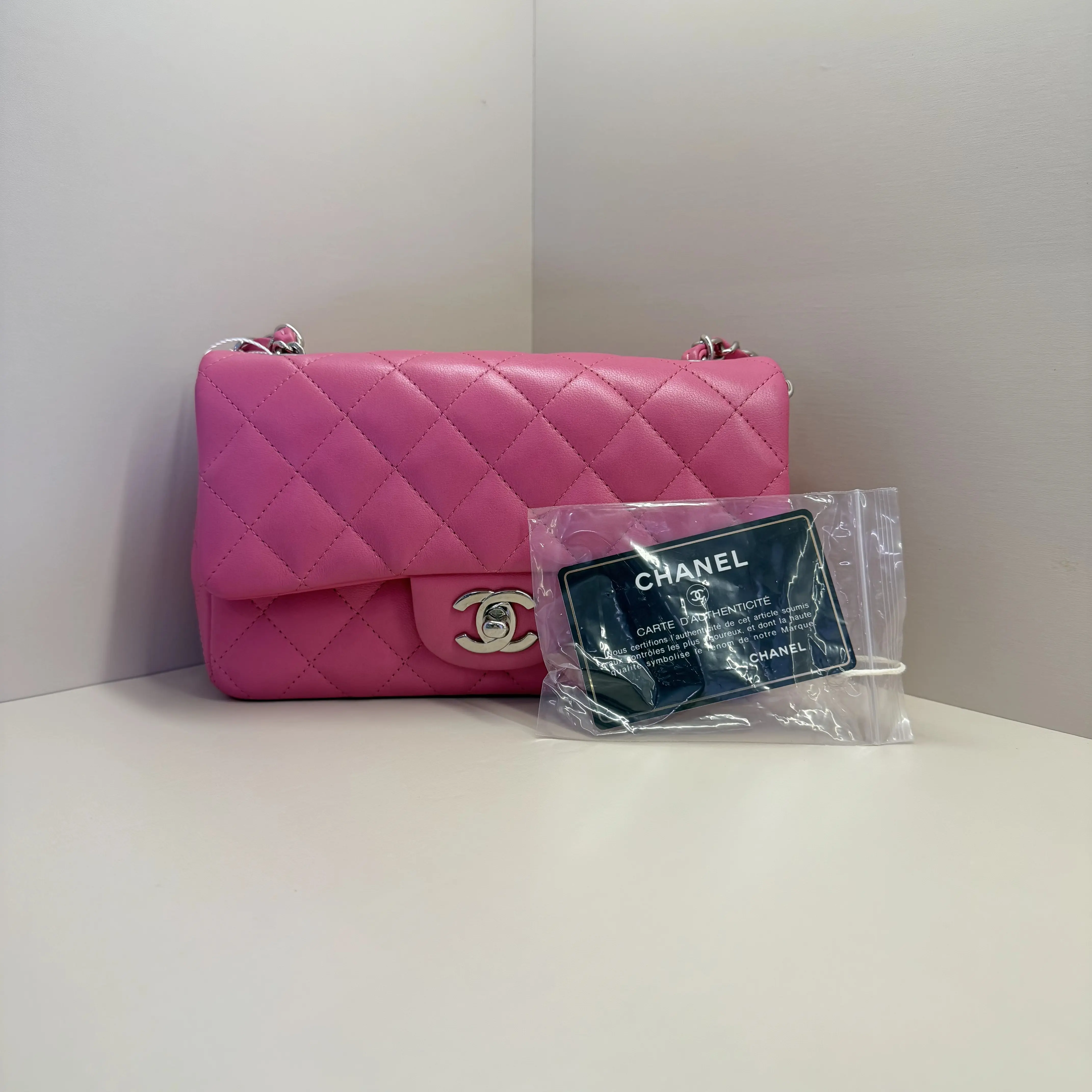Pre-owned CHANEL Mini Rectangular Classic Flap Bag, Hot Pink Lambskin Leather with Silver Tone Hardware (Serial #27168450, Circa 2018–2019, Made in France)A176 HK
