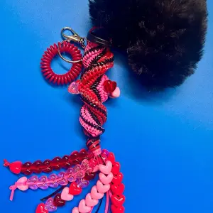 Handmade Stylish Keychain - Pink, Red, Black Beaded Boondoggle Bag Charm Accessory with Black Fuzzy Heart, Phone Cord Wristlet, Practical Casual Design
