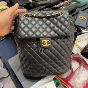 Pre-owned CHANEL H5 Black and Gold Chain Backpack bz051920