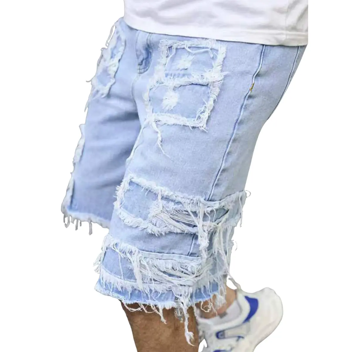 Distressed raw-edge denim shorts with slight stretch; pants without a drawstring—an edgy urban casual staple