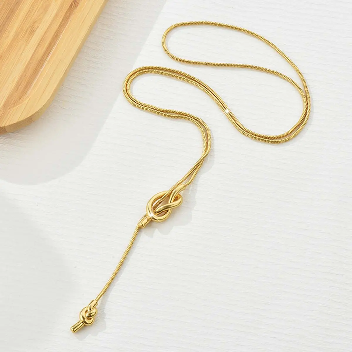 Women's Love Knot Long Chain Necklace, Metal-Coated Chain & Link Jewelry Accessory, Knotted Pendant Sweater Accessory, Modern Versatile Everyday Wear Jewelry, Love Knot Necklace