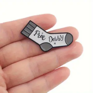 1/2pcs Cute "FREE DOLBY" Enamel Lapel Pin - Chic Metal Brooch with Black & White Design for Backpacks & Bags - Ideal Gift for Friends