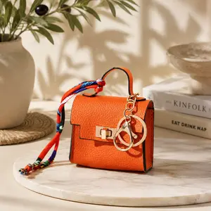 1PCS Mini Kelly Bag Charm - High-Quality Durable PVC Keychain, Compact Stylish Purse Accessory, Inside Purse Accessory for Storing Earphones, Lipstick, Inside Purse Accessories