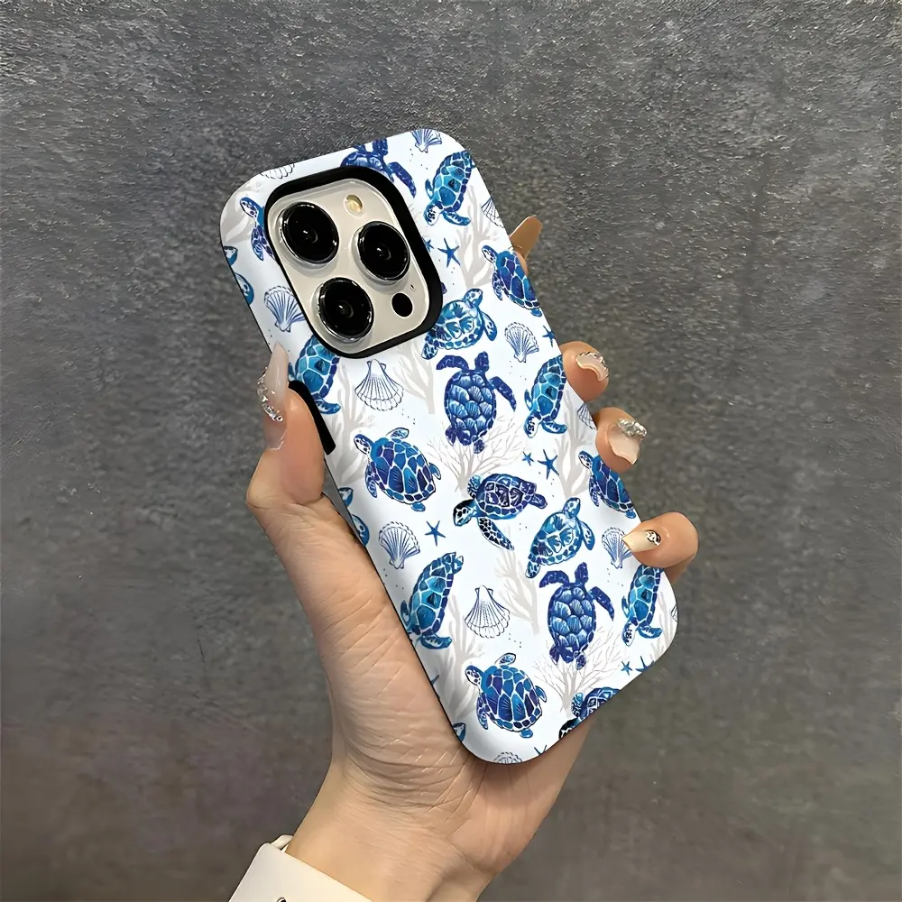 A durable 2-in-1 protective case with a turtle shell design, ocean blue background, and coral and seaweed patterns. It's compatible with iPhone 17/16/15/14/13/12/11 Pro Max/Plus/Pro and Samsung Galaxy S25/S24/S23 Ultra series. Also suitable for couples.