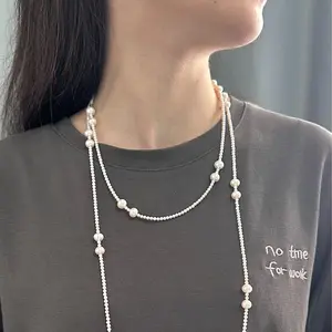 NC50-The ‘Sonata’ Sautoir — A Rhythmic Station Necklace of Freshwater Pearls. long pearl necklace, pearl sautoir, station pearl necklace, opera length necklace, sweater chain, freshwater pearls, quiet luxury, old money aesthetic, layering necklace