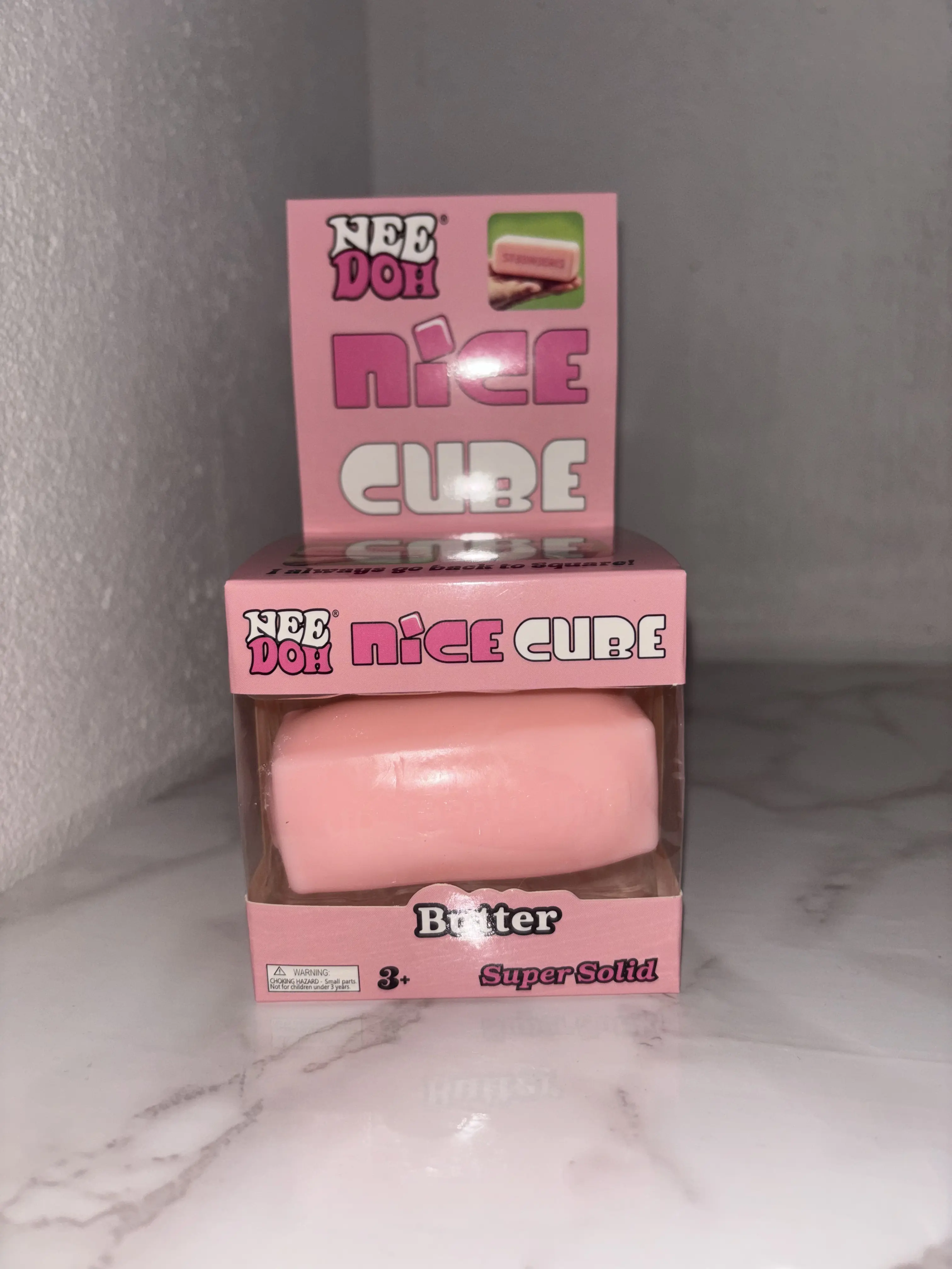 Needoh A delicate pink cuboid