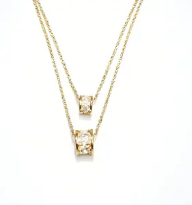 Gold Tone Double Layer Rotating Cylinder Pendant Necklace, Minimalist Sparkle Accessory for Everyday Wear & Gifting