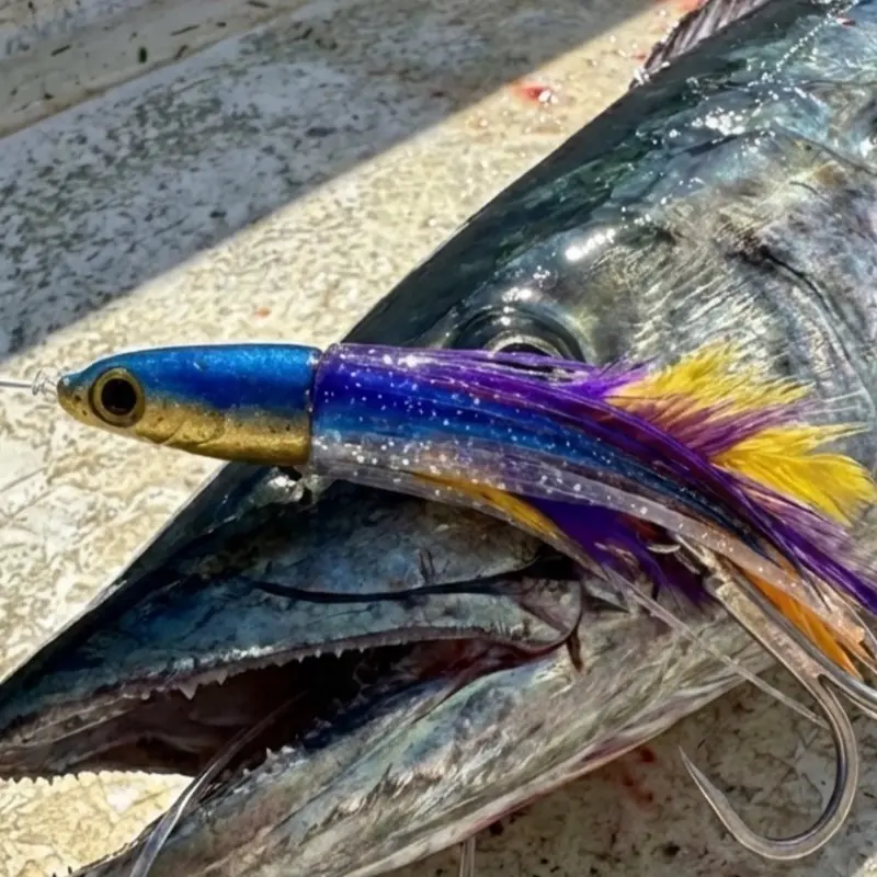 Pelagic Trolling Lure with Vibrant Blue and Yellow Tail for Effective Fishing