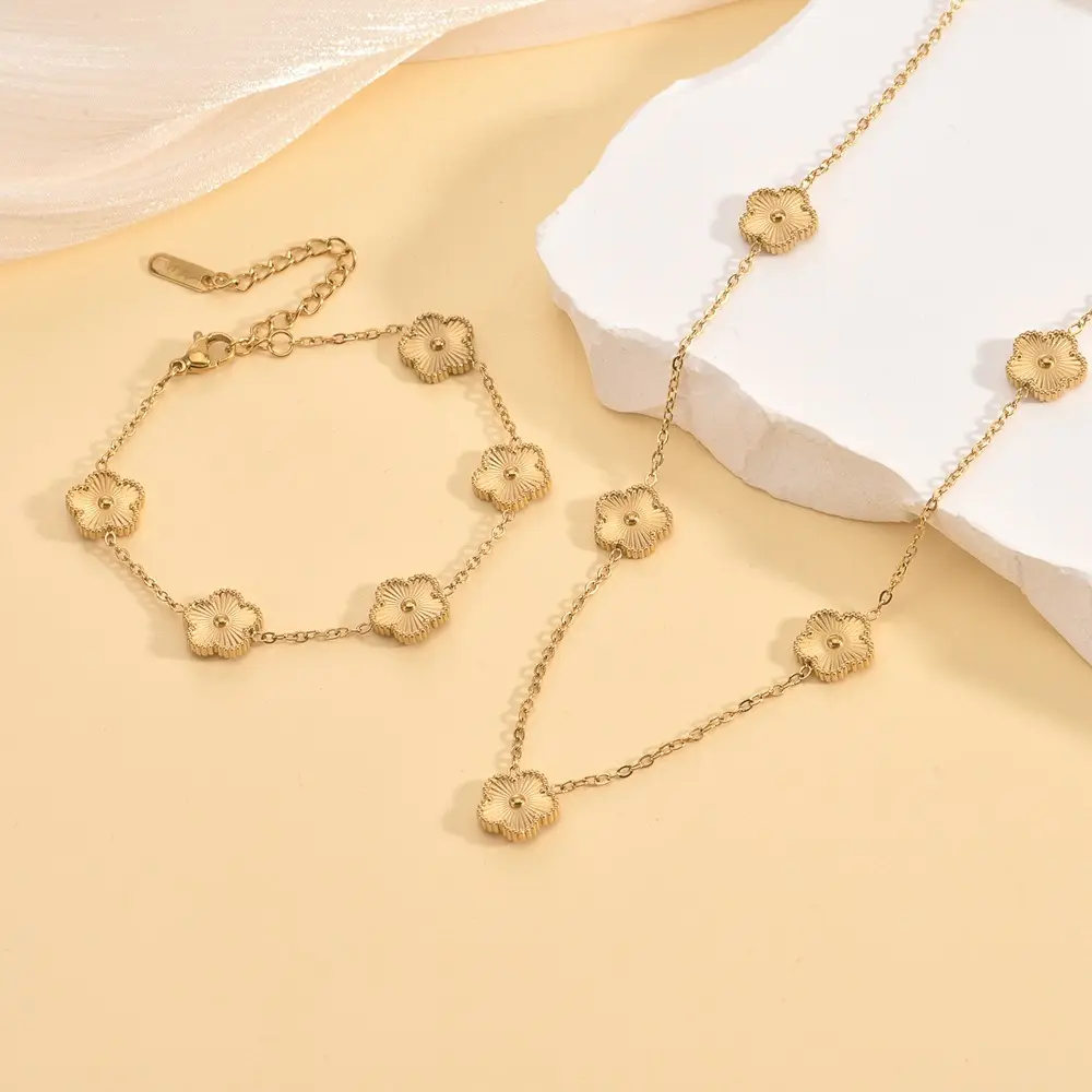 LUX-JELWEL -  High-Quality Plum Blossom Plant Metal Five Leaf Flower Bracelet Necklace With Double-Sided Y2K Style Clover