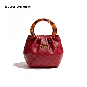 The Tangerine Ring Pouch - Chic Quilted Bucket Bag Soft Faux Leather with Tortoiseshell Handle for Summer Vacation Resort trendy all-match commuter bag